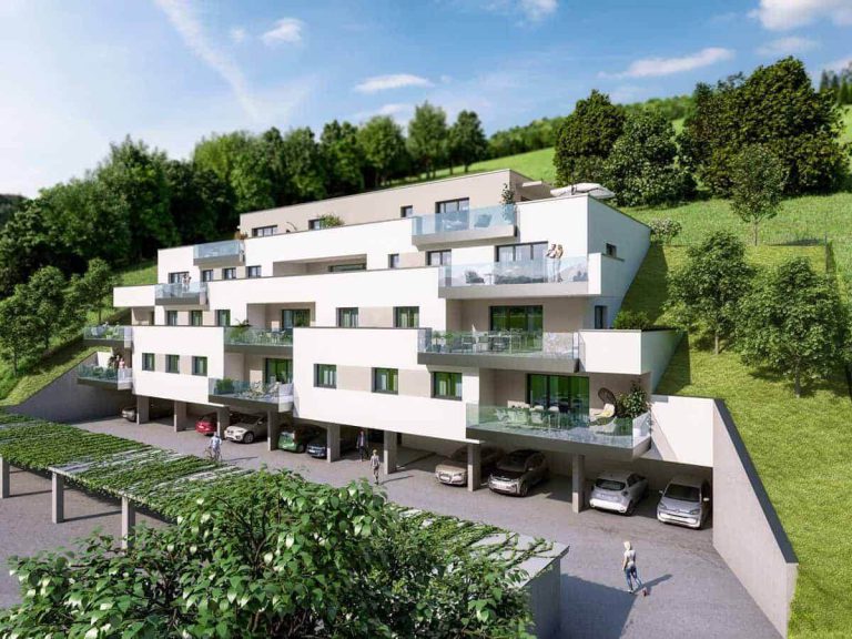 Moderne Wohnanlage „Hillside“ in Saalbach mit Balkonen und Garagen, umgeben von Natur.