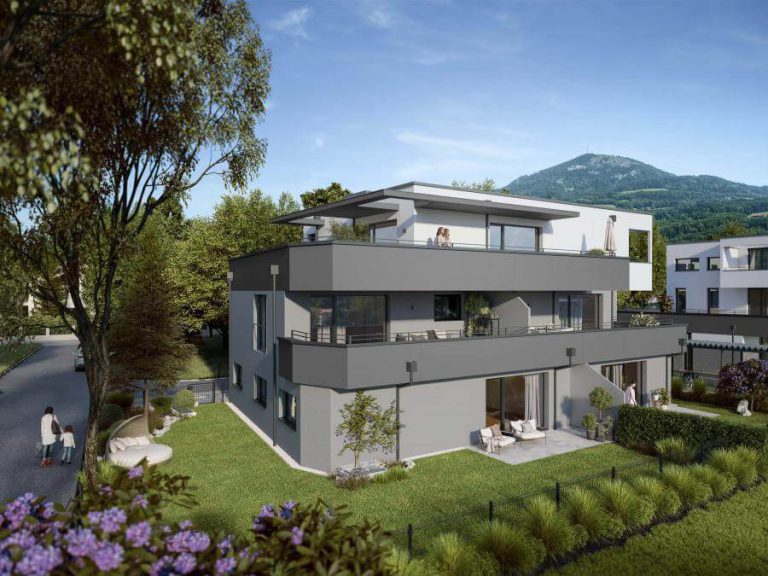 Moderne Wohnanlage mit großzügigem Garten und zeitgemäßer Architektur in Salzburg.